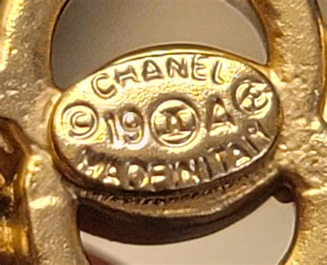 how to tell real chanel jewelry from fake|authentic chanel jewelry stamp.